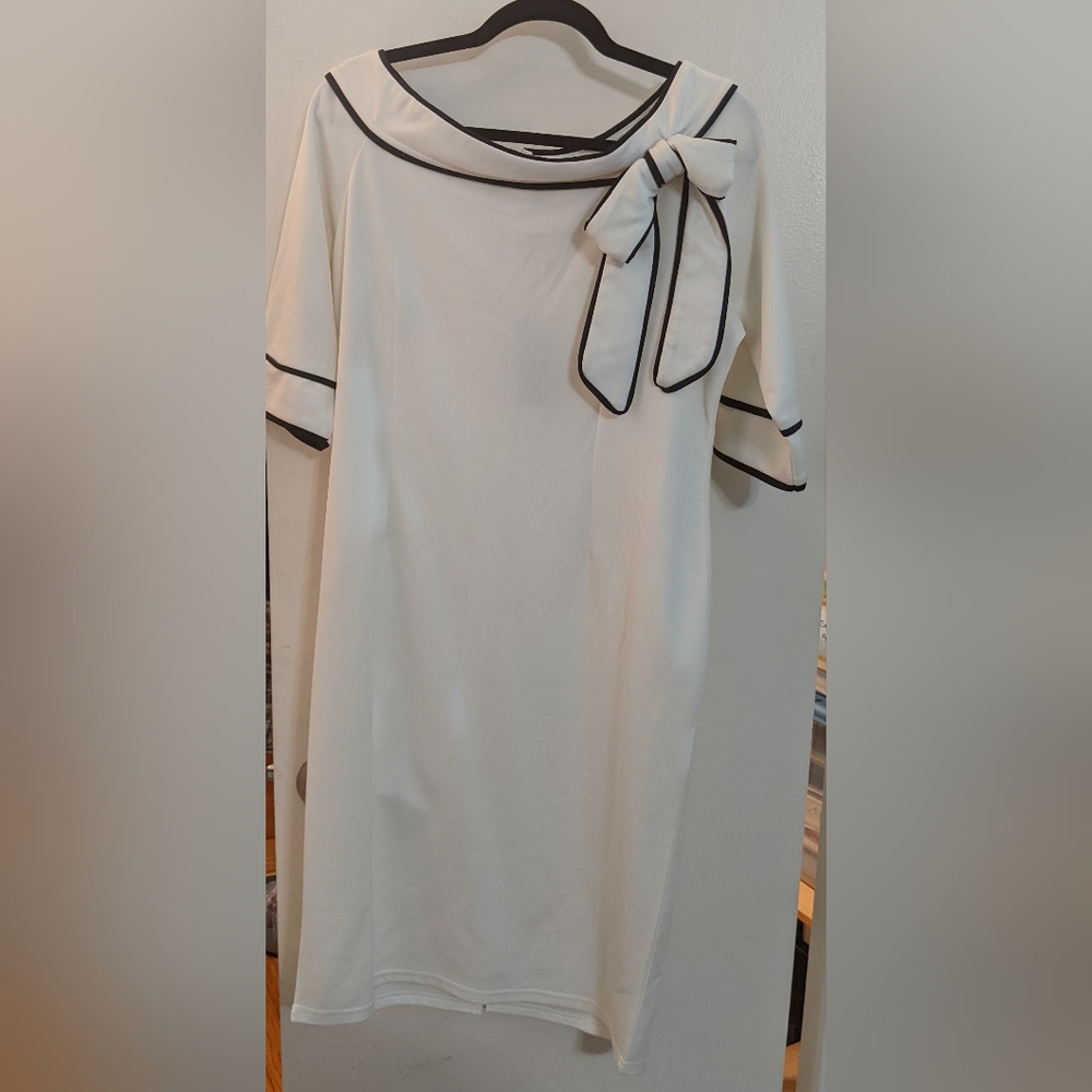 White 3/4 sleeve dress, with black trim & bow detail